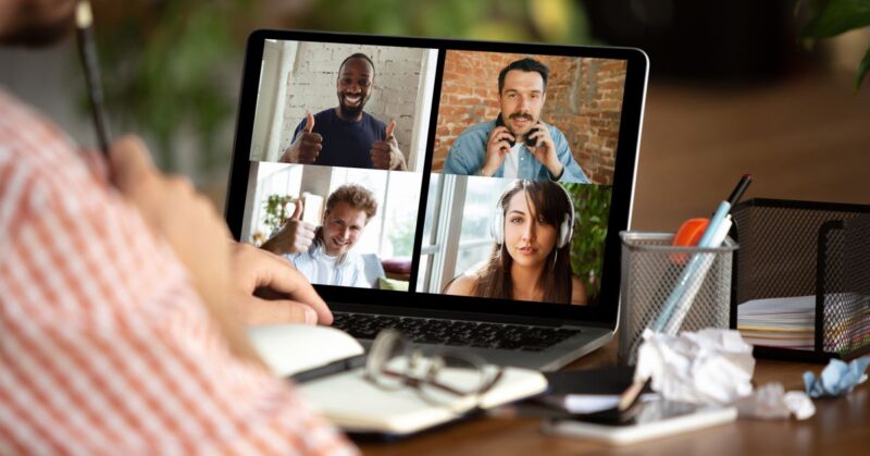 Laptop open with an ongoing online meeting with Trucentive employees