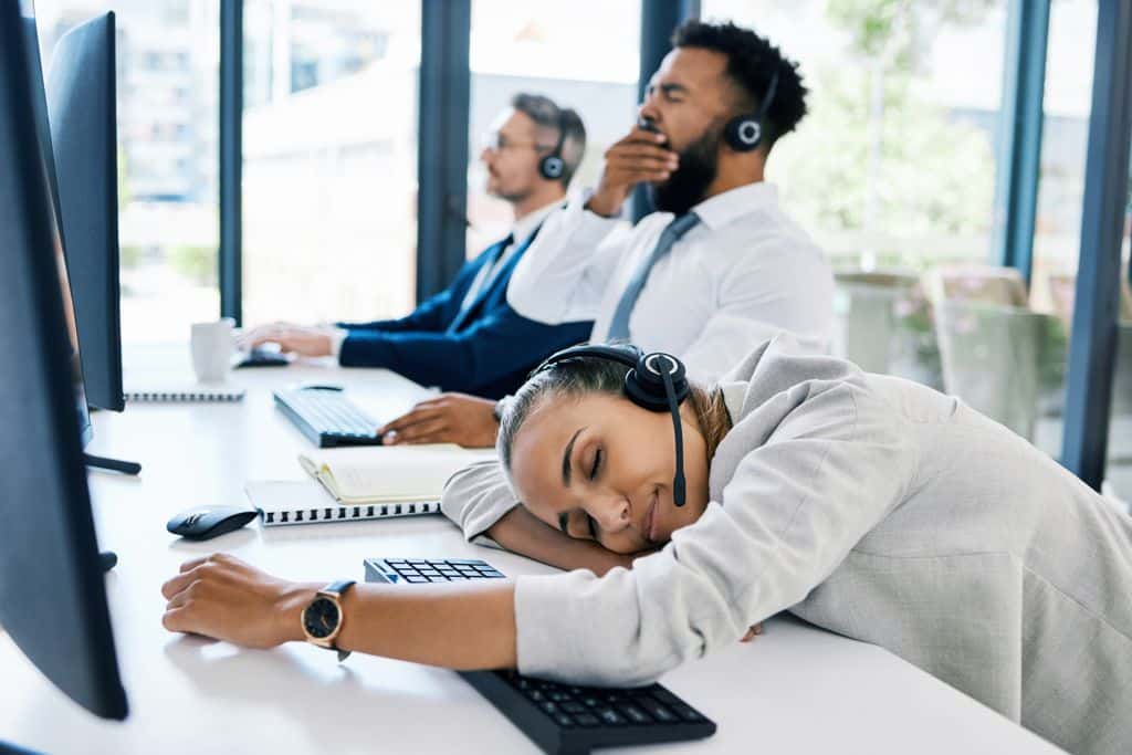 Unmotivated call center employees falling asleep on the job