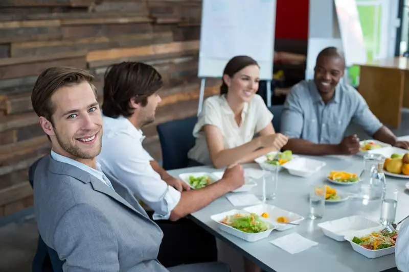 A group at lunch engaging about a new project