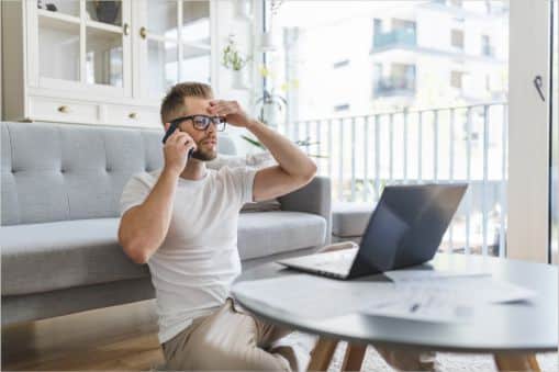 Stressed businessman at his computer