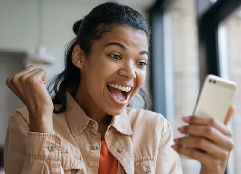 Excited employee gets a birthday gift from her company via SMS