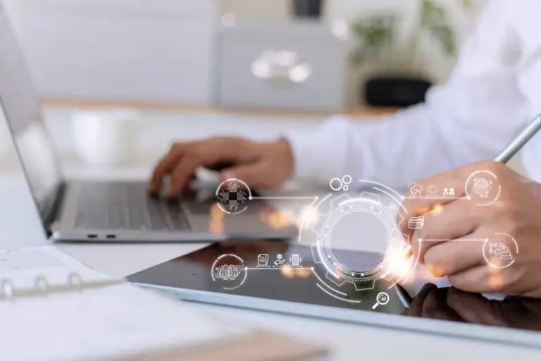 incentive automation image of keyboard, tablet and person with digital pen