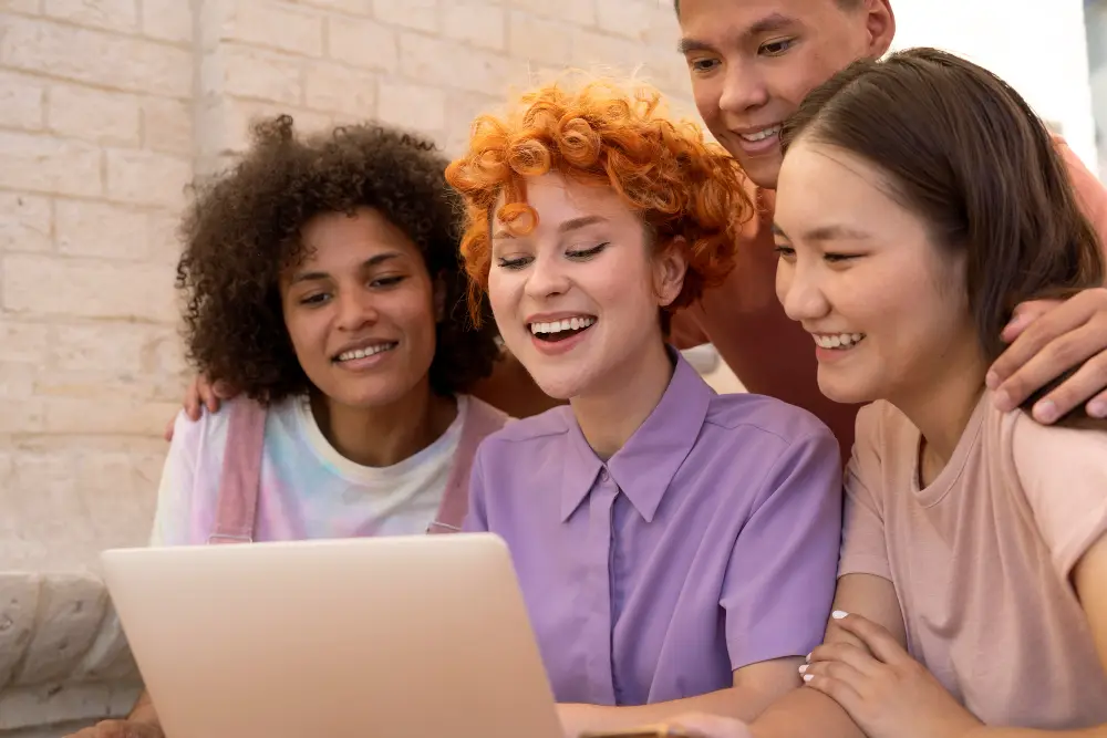 Employees viewing gift choices on a laptop