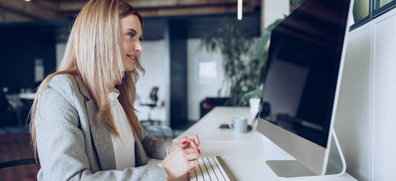 woman reading her email thank you