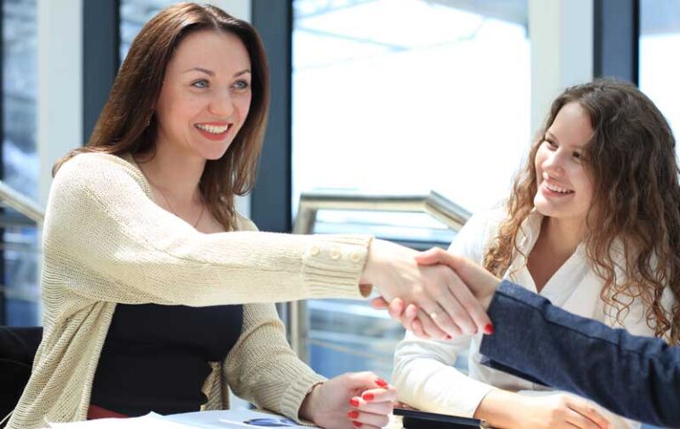 executives-shaking-hands-loyalty