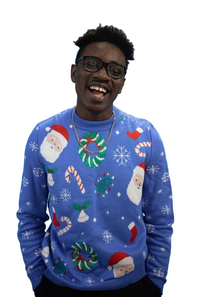man wearing sweater to holiday party